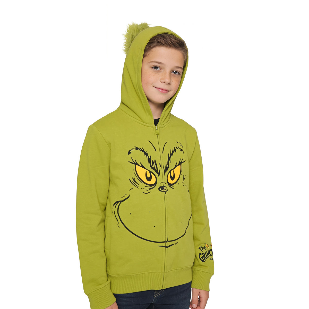 Child wearing the green Grinch zip up hoodie with hood up, three-quarter view on white
