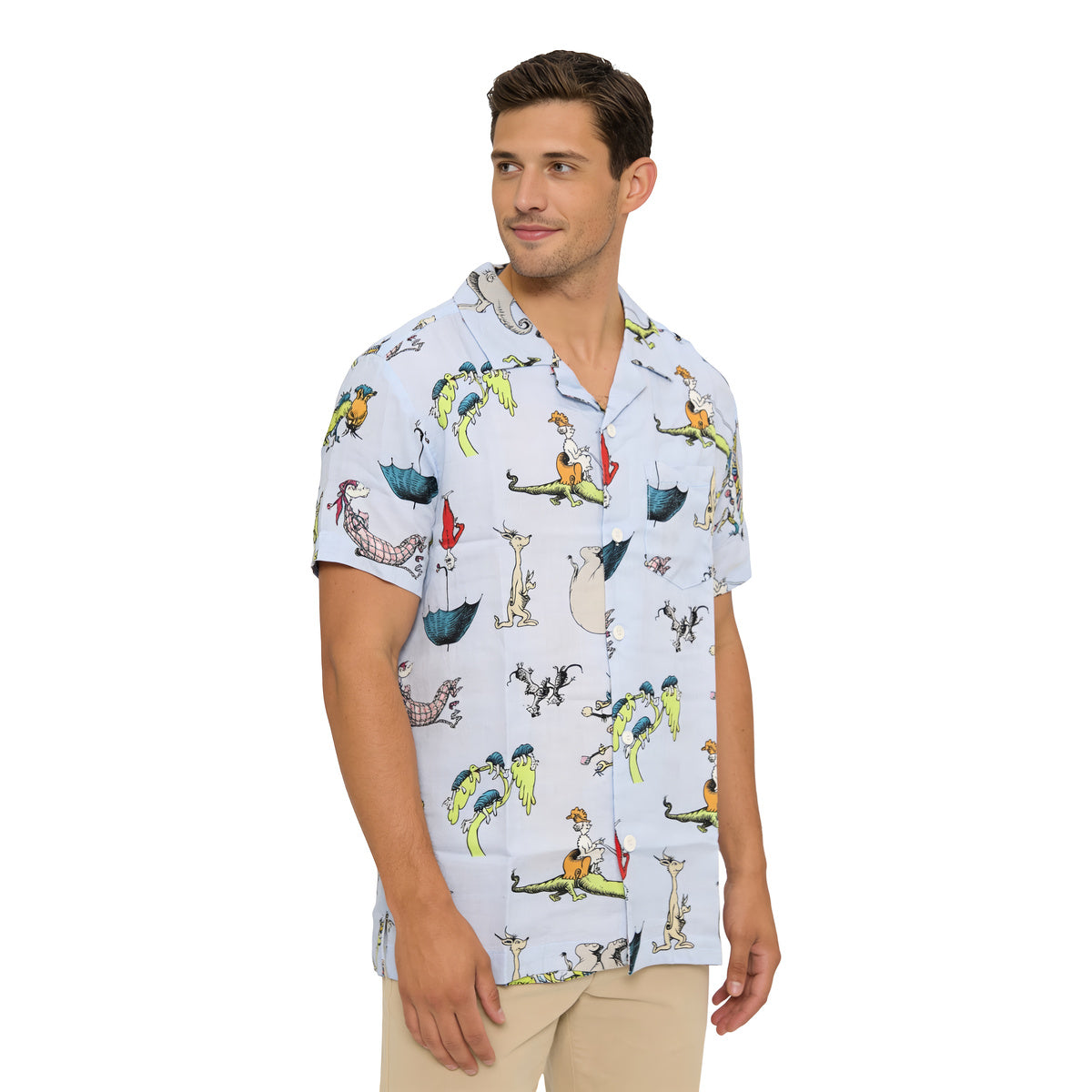 Man in the Dr. Seuss characters button up shirt with khaki pants, three-quarter view on white