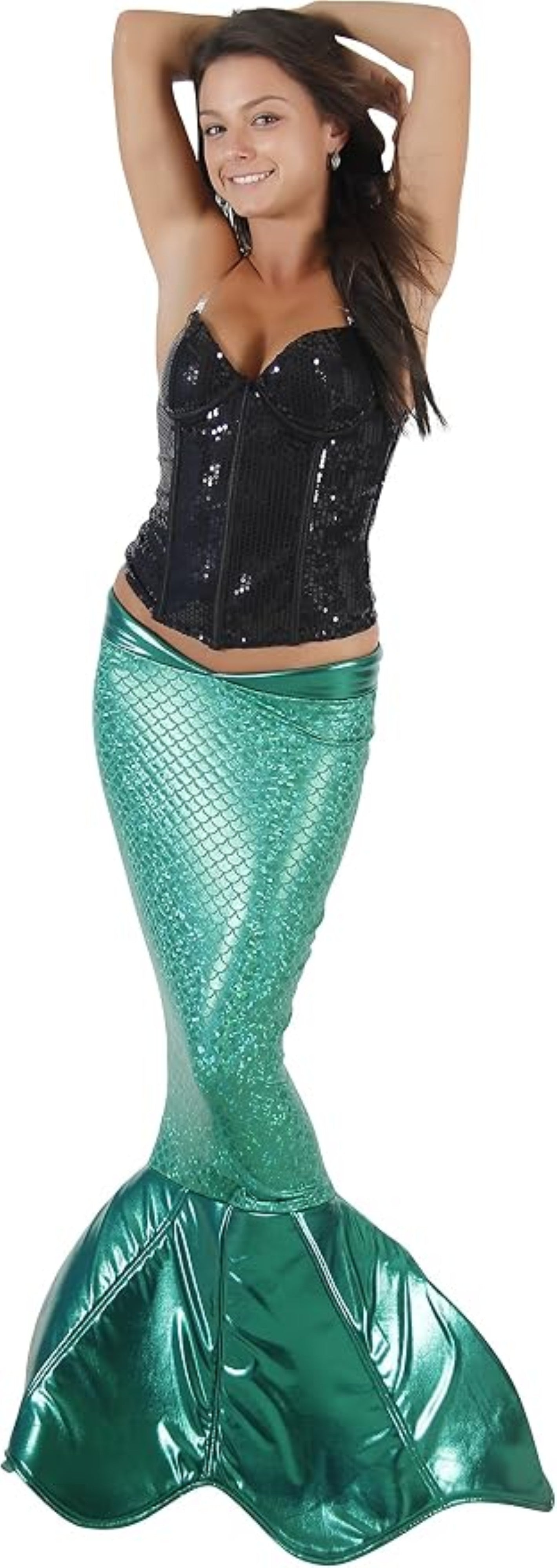 A woman modeling a mermaid costume with a black sequined corset top and a shiny green metallic mermaid tail against a plain white background.