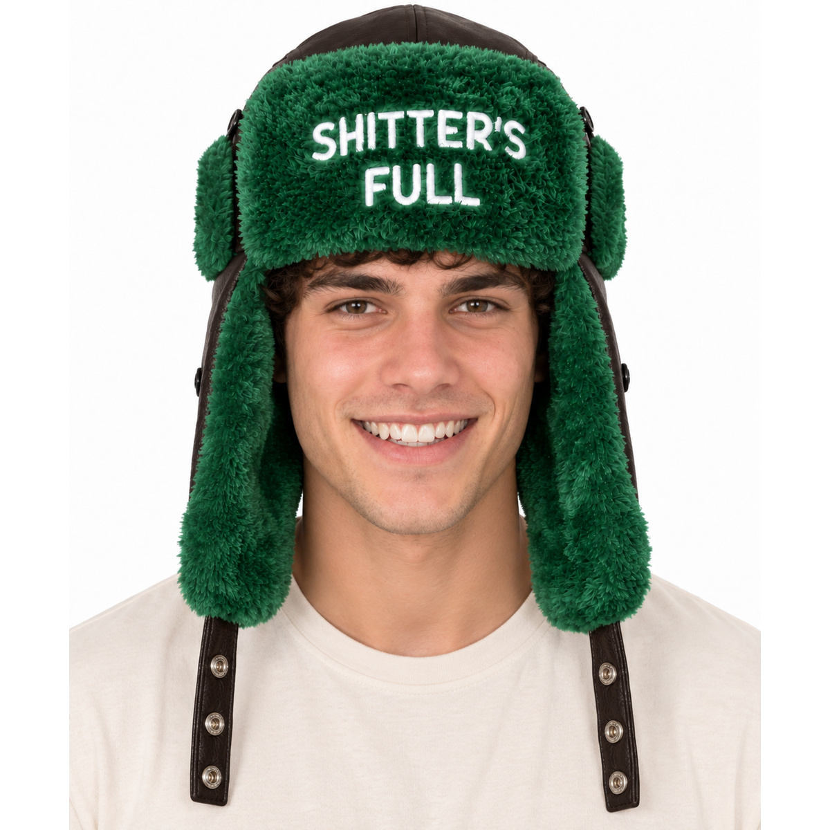 Man wearing Christmas Vacation Shitters Full trapper hat with green fur ear flaps, front view on white