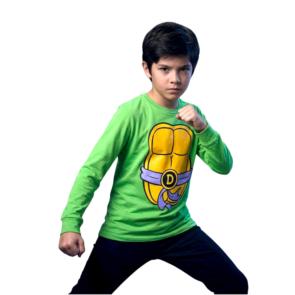 Child wearing TMNT Donatello costume long sleeve T-shirt in a fighting pose on white background