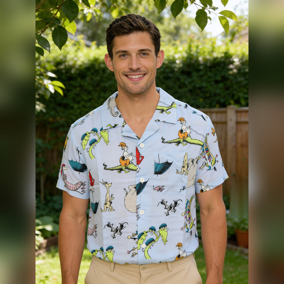 Smiling man in the Dr. Seuss characters rayon shirt in a backyard garden
