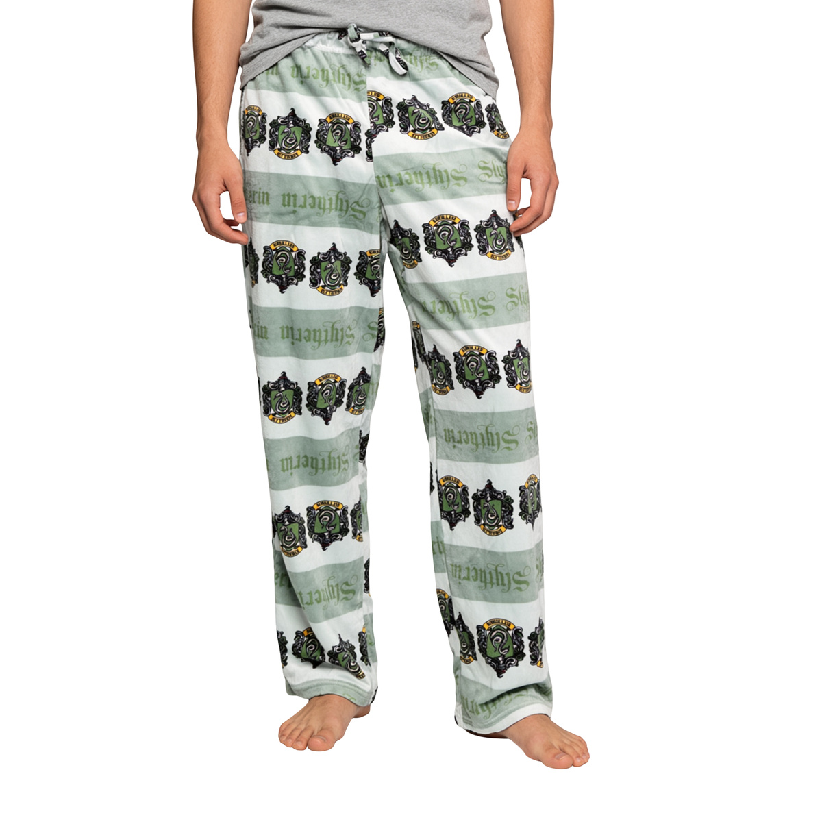Green and white Harry Potter Slytherin plush sleep pants with house crest print, front view