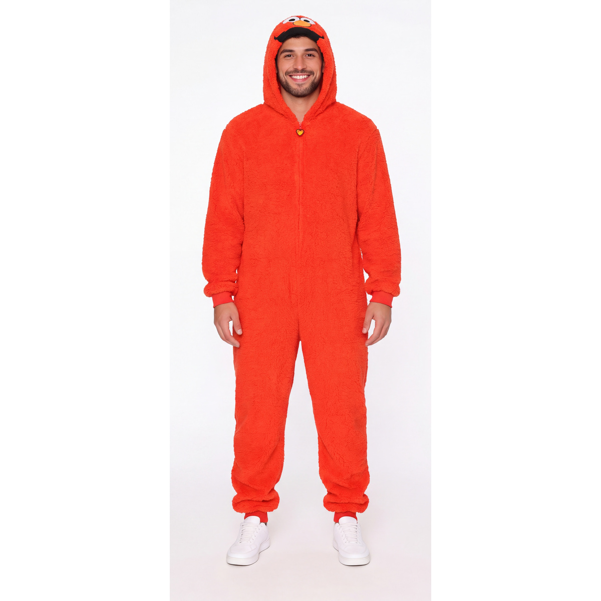 Smiling man in the red Elmo plush hooded costume jumpsuit, full front view on white