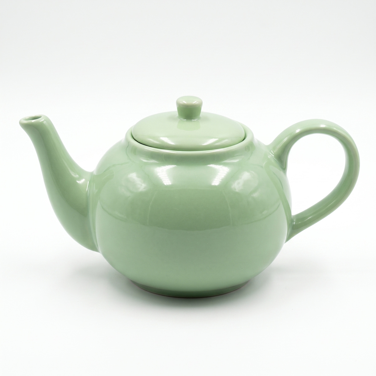 Jim & Pam's The Office replica seafoam green teapot on white background