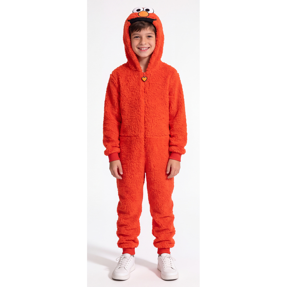 Smiling child in the red Elmo plush hooded costume jumpsuit, full front view on white