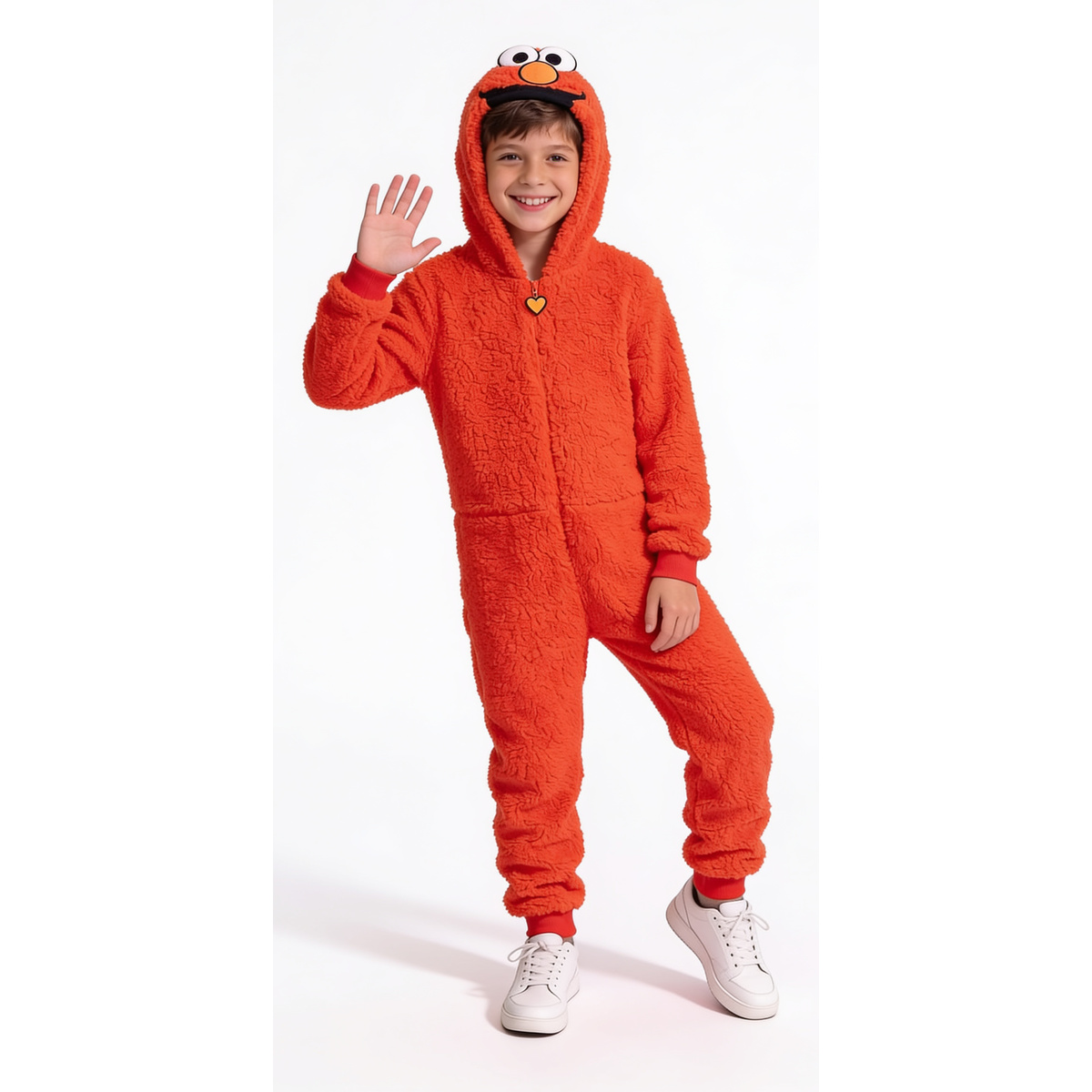 Child waving in the red Elmo costume pajamas jumpsuit with the Elmo face hood