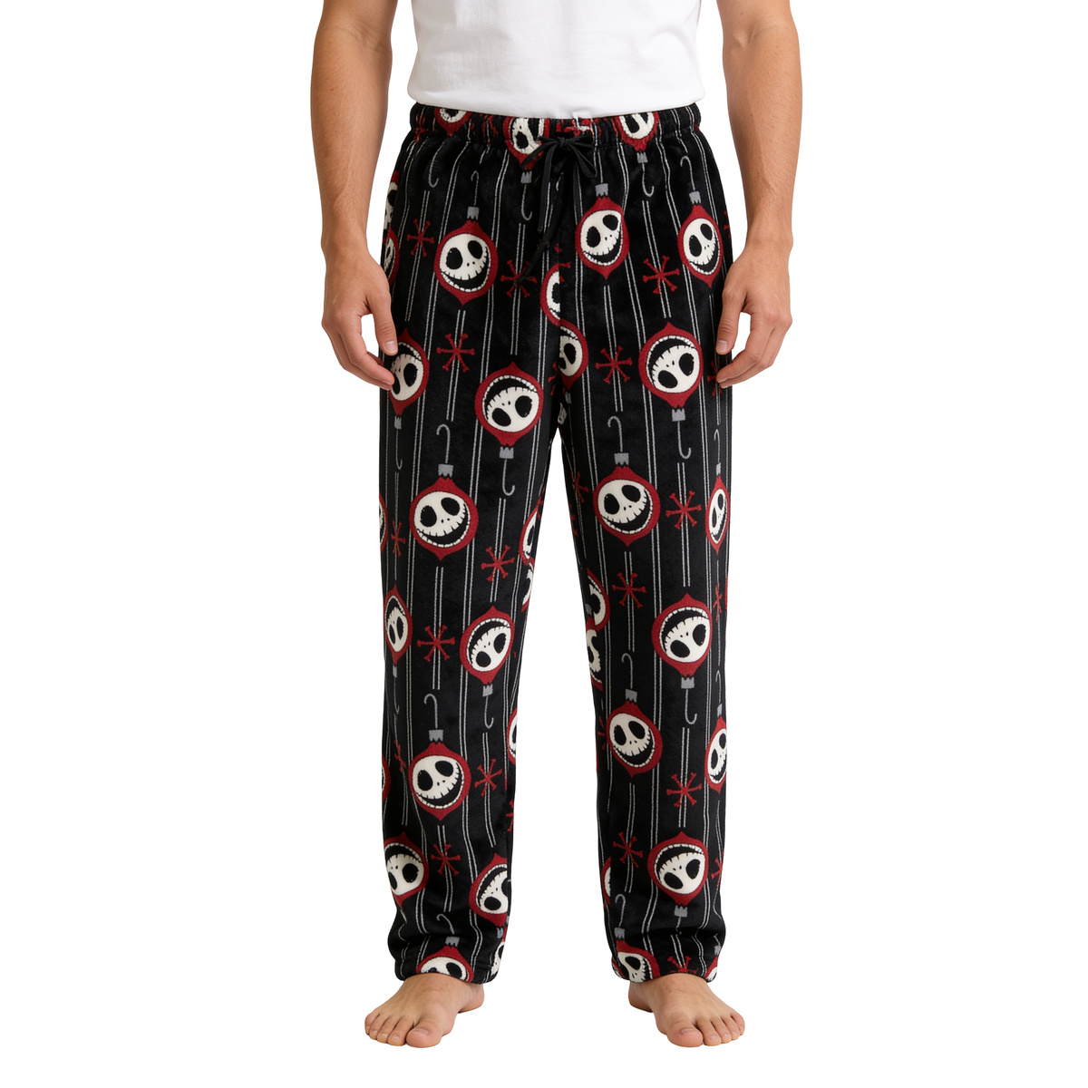 Black Nightmare on Christmas Jack lounge pants with red striped skull print, front view