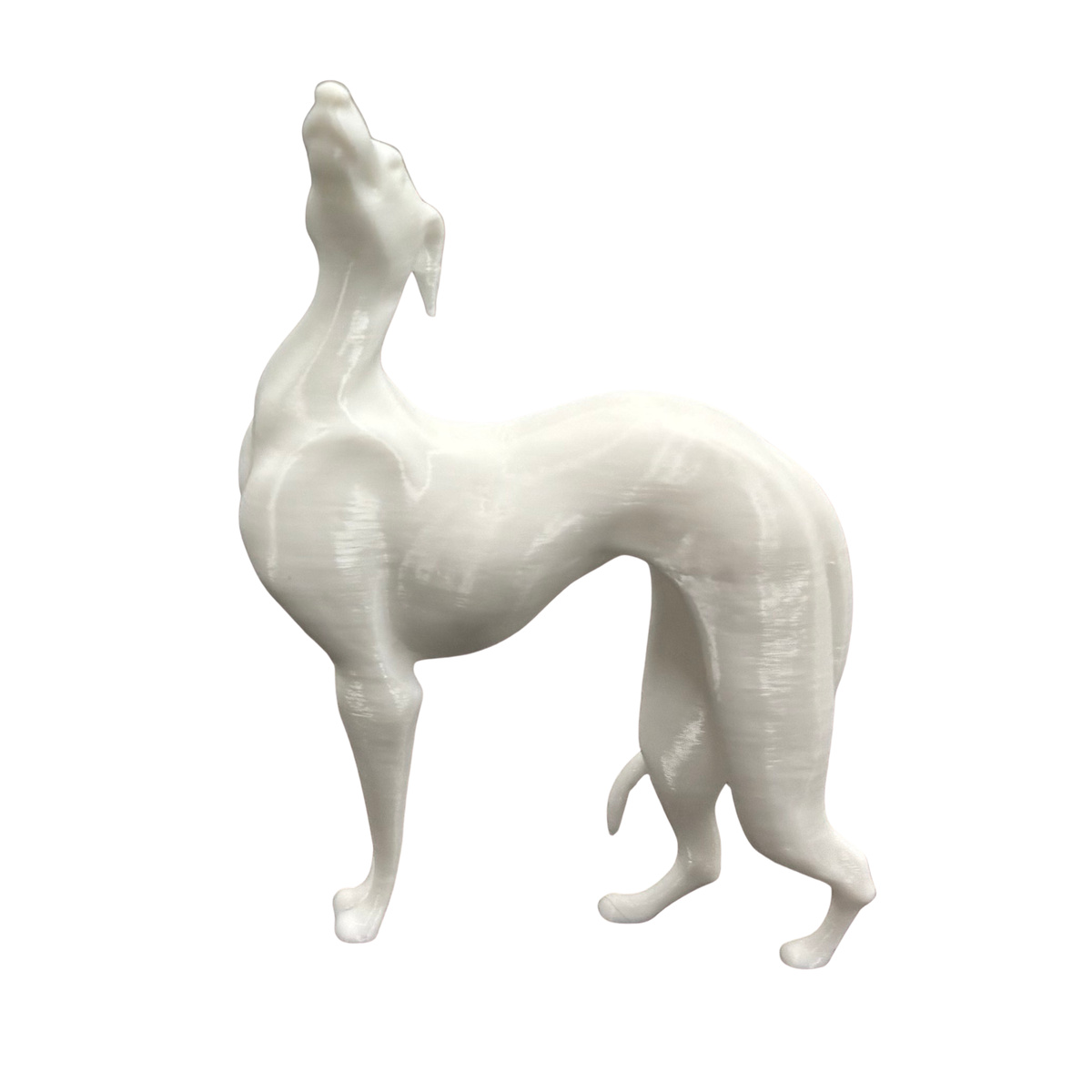 Pat the Dog white greyhound figurine, three-quarter view on white background