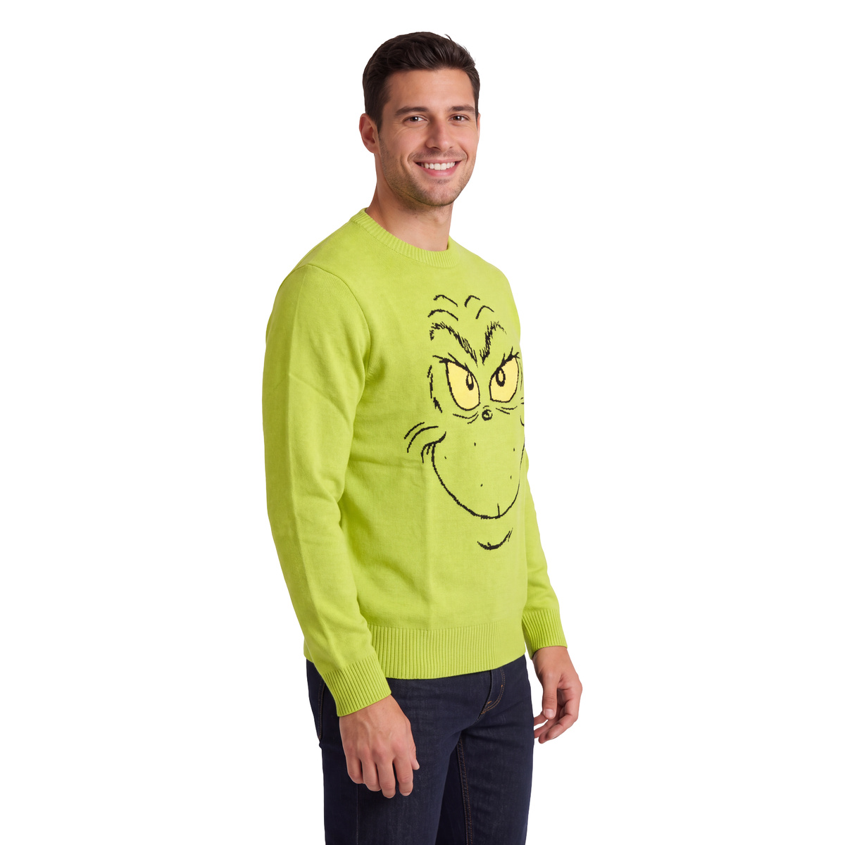 Man in the Grinch Big Face knit Christmas sweater, three-quarter view on white
