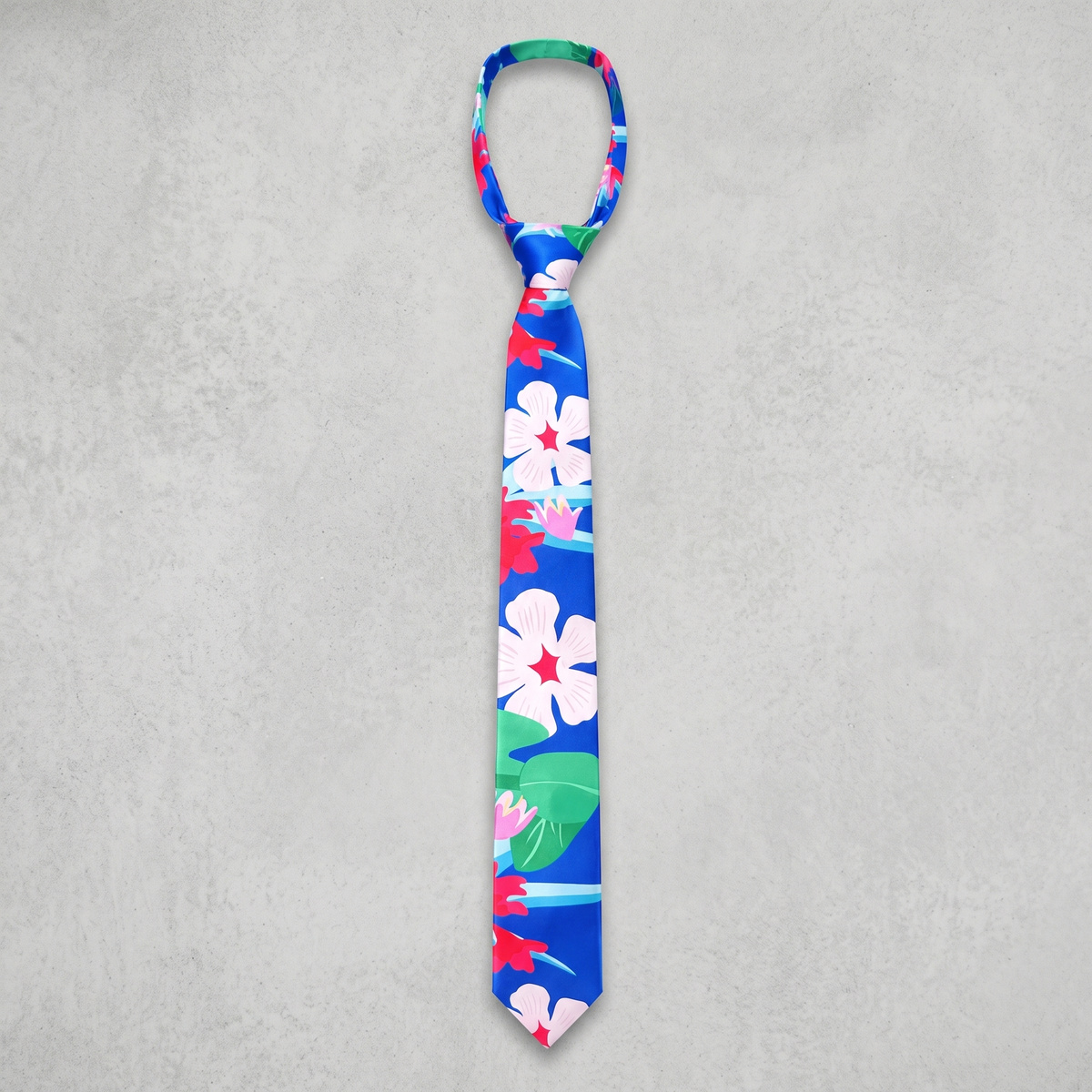 Blue floral Hawaiian costume tie on a light grey textured background